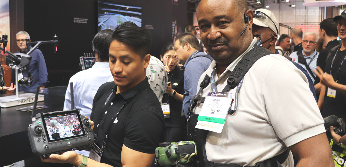 Chris Tuazon of DJI and Loren Moss of Cognitive Business News. (Credit: Liliana Padierna)